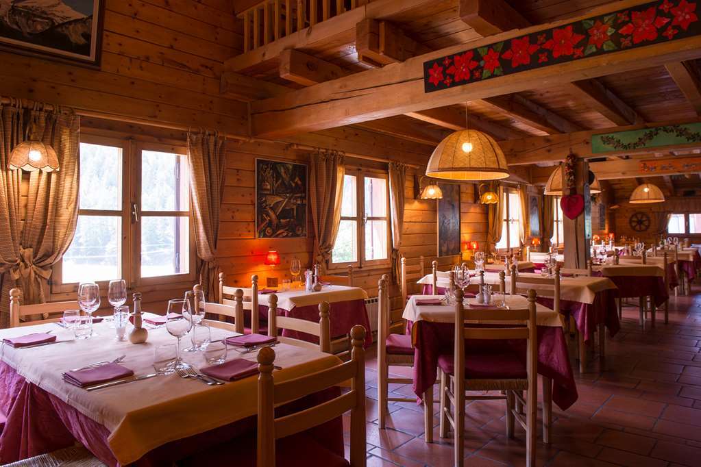 Eco Wellness Hotel Notre Maison Cogne Restaurant bilde